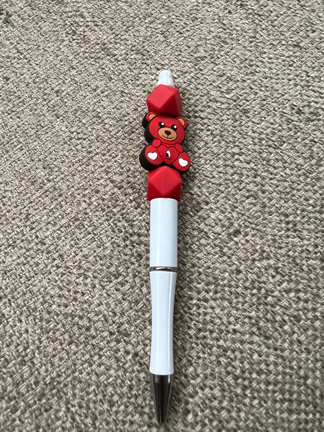 Red bear white pen