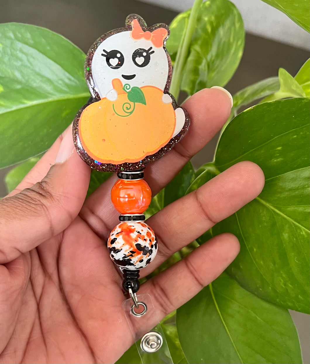 Ghost/pumpkin badge reel